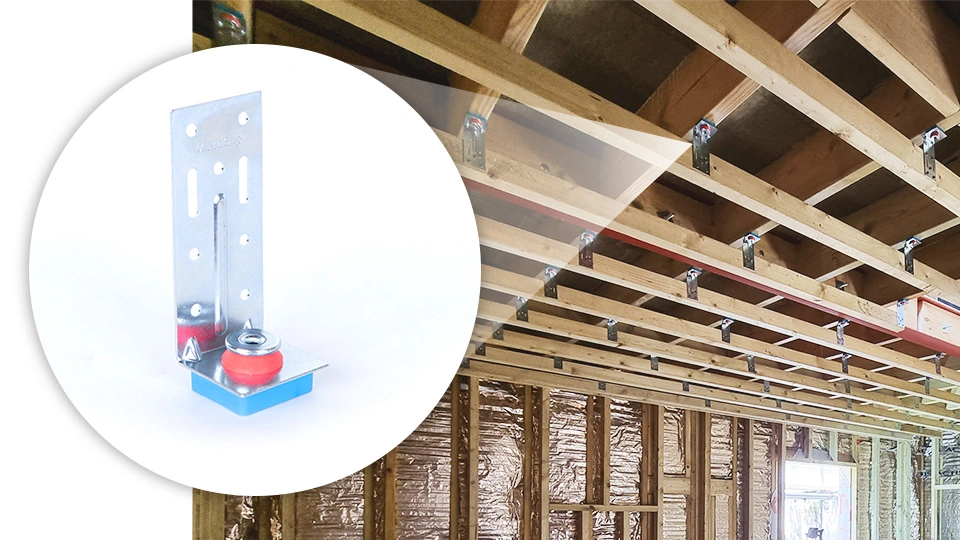 isolation clips on ceiling joists to show how a ceiling can be soundproofed