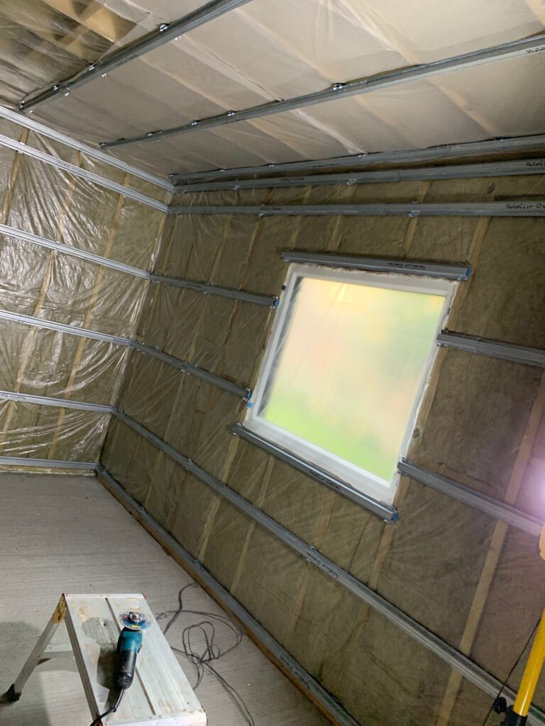 insulating a shed with acoustic mineral wool
