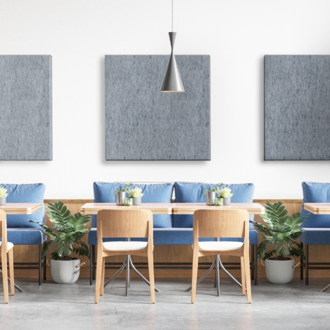 Grey square acoustic panels in a cafe