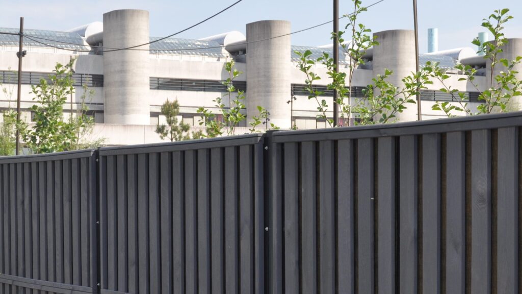 acoustic barrier around an industrial plant to prevent noise escaping