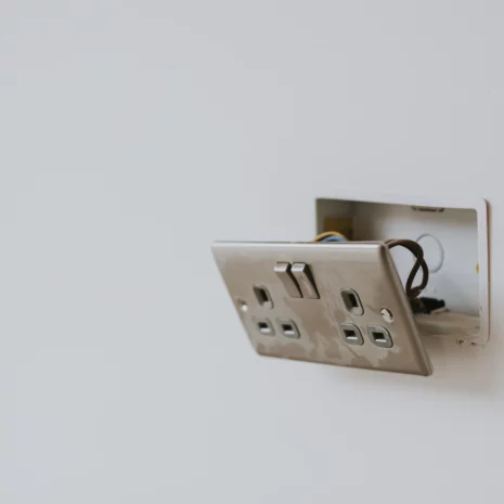 broken power outlet wall